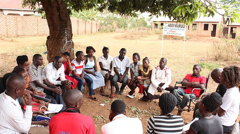 A group being surveyed engaged in community discussions.
