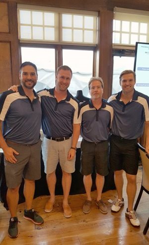 LEA employees with guests at the 2018 Providence Golf Classic.