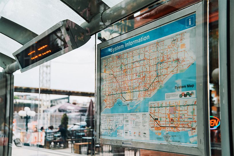 An image of a transit system map and related ITS technology.