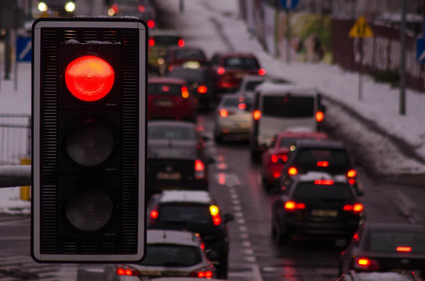A traffic signal showing a red stop light.