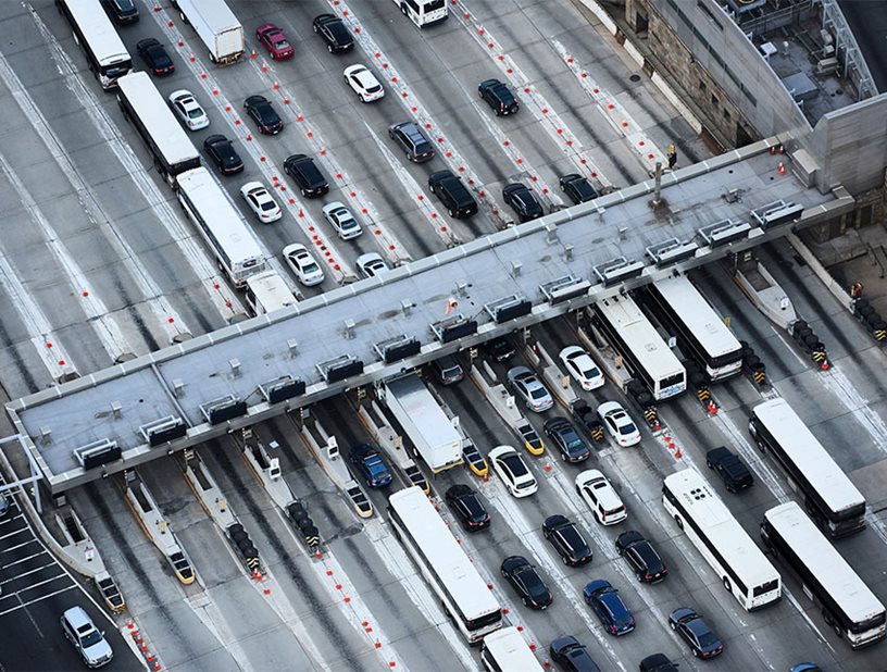 An aerial view of a freeway tolling system.