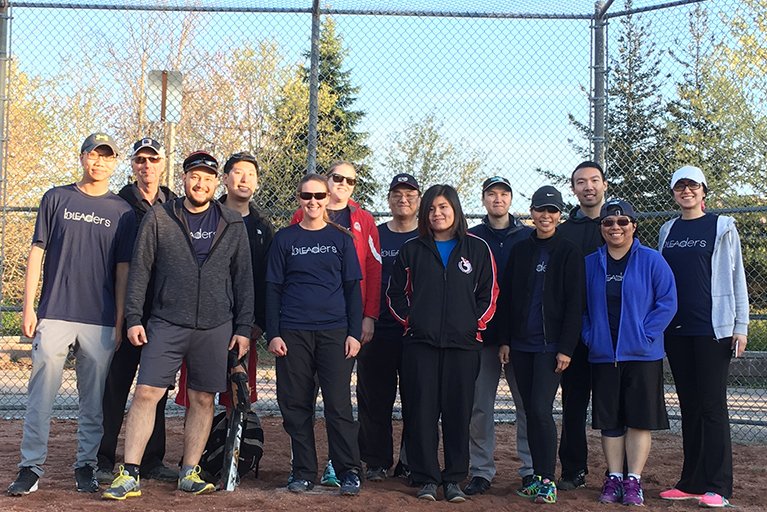 Group photo of the bLEAders softball team.